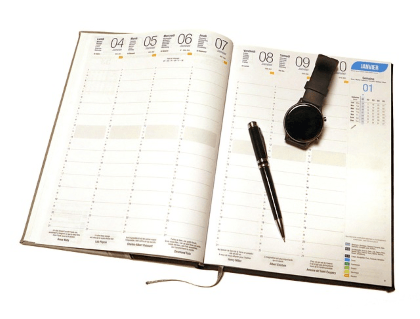 aidants génération sandwich. agenda ouvert symbolisant la nécessité de l'organisation